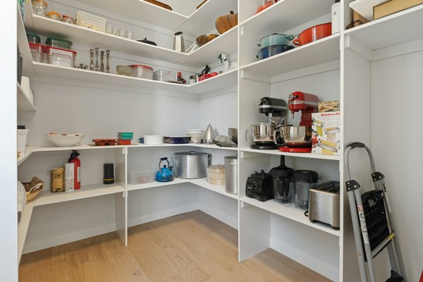 How can you maximize pantry organization with sliding shelves?